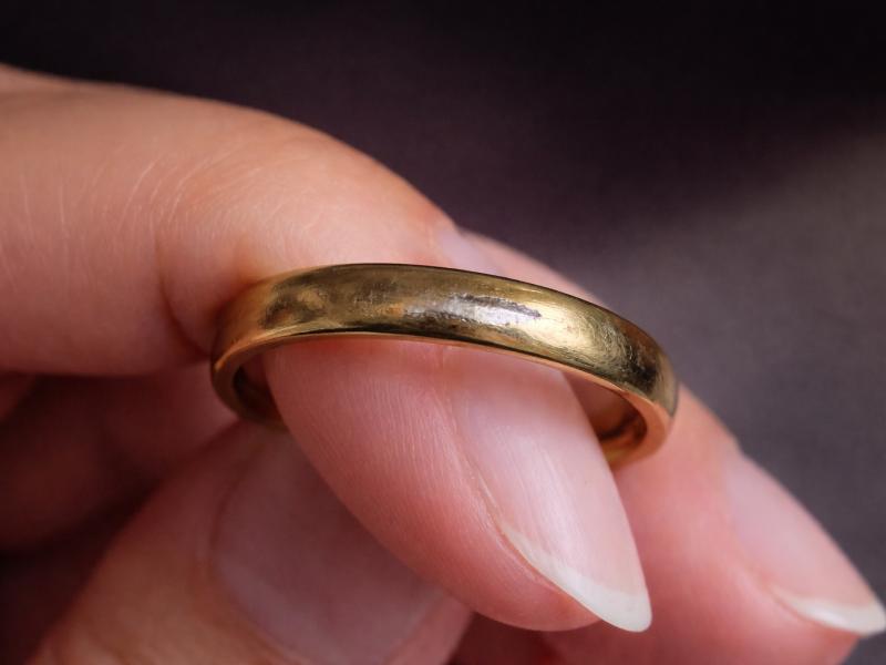 Faded gold plated ring showing surface wear over time